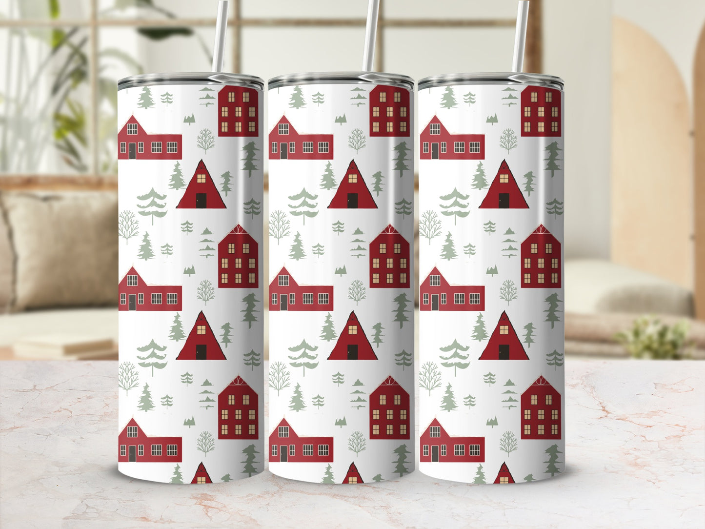 Red houses and green pine trees pattern on tumblers with straws.
