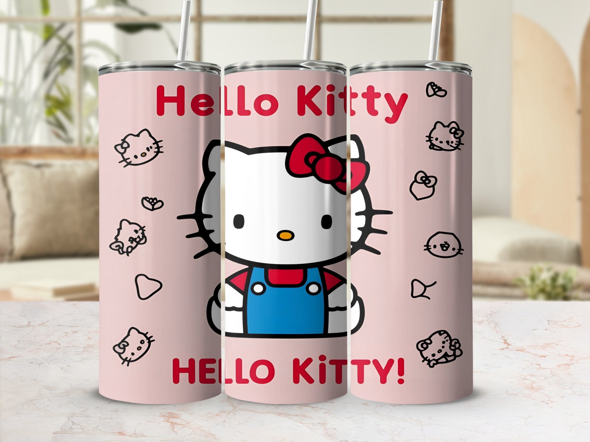 Pink tumbler with Hello Kitty graphic and "Hello Kitty!" text.