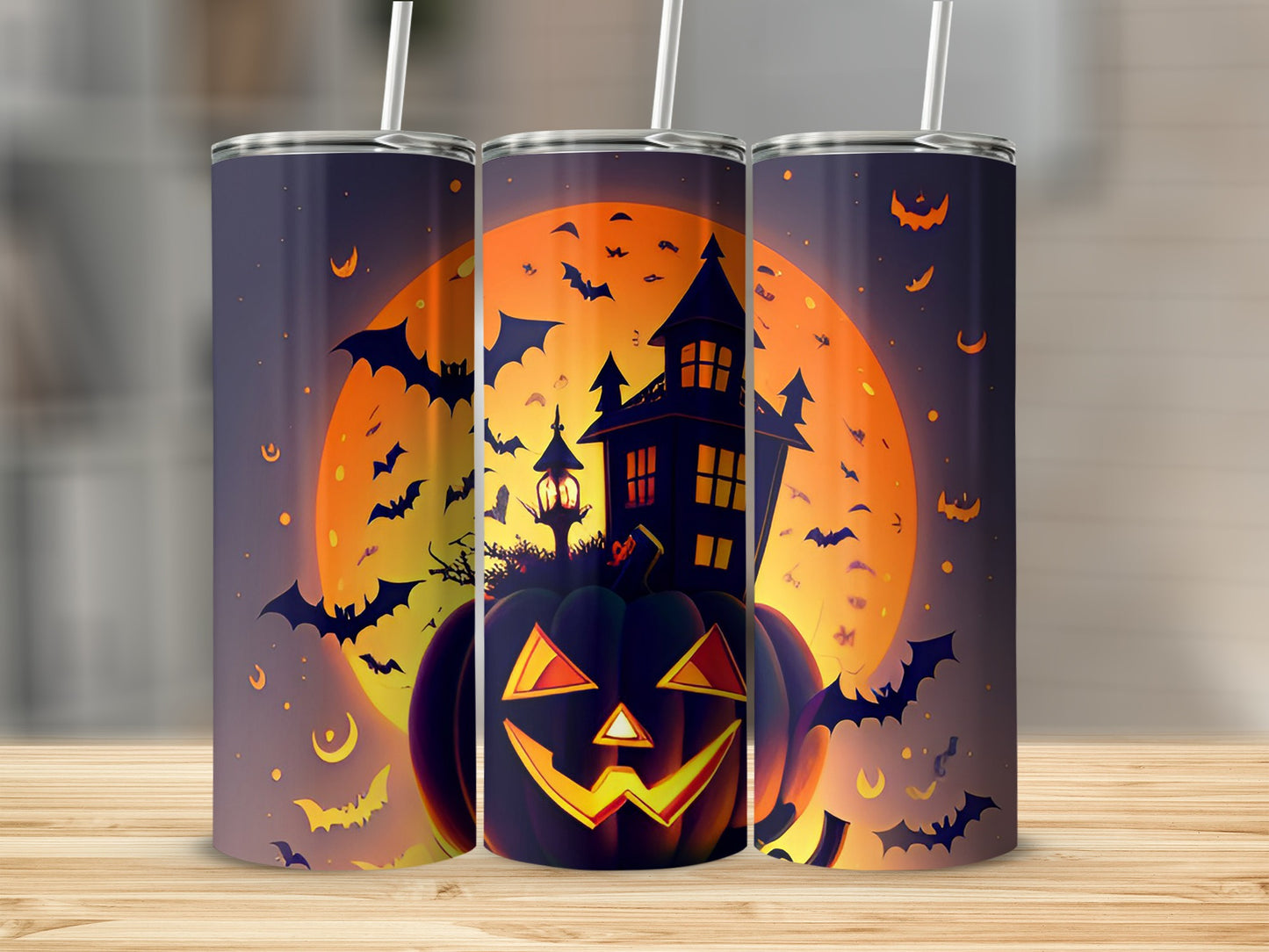 Halloween tumbler with jack-o'-lantern, haunted house, and bats against a full moon.