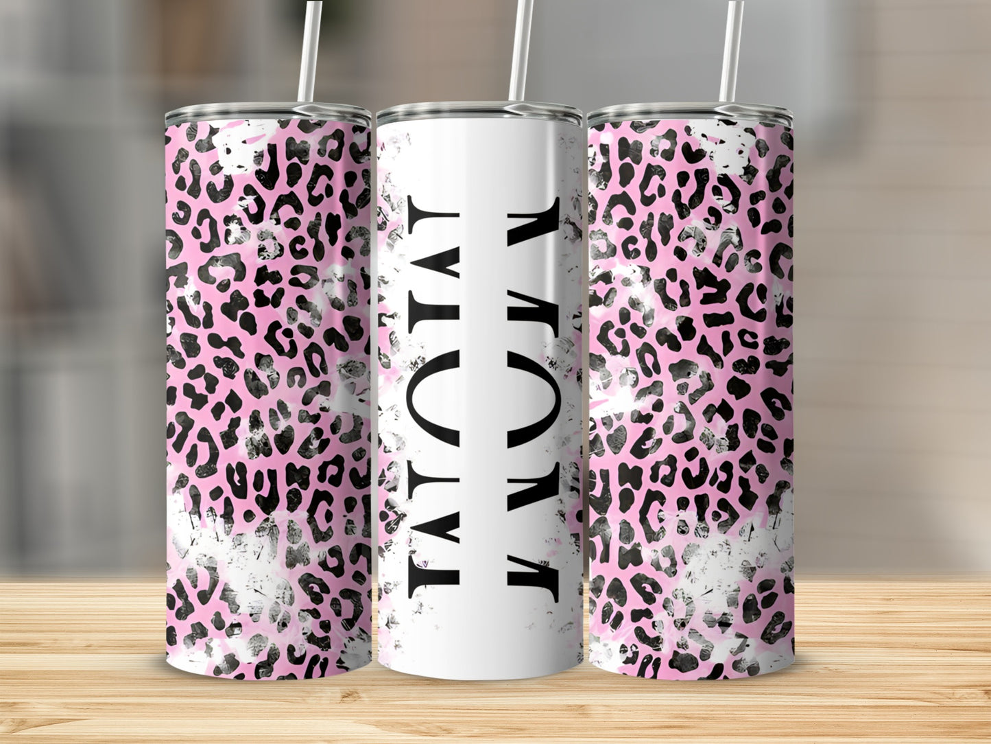 Pink leopard print tumbler with "MOM" text.
