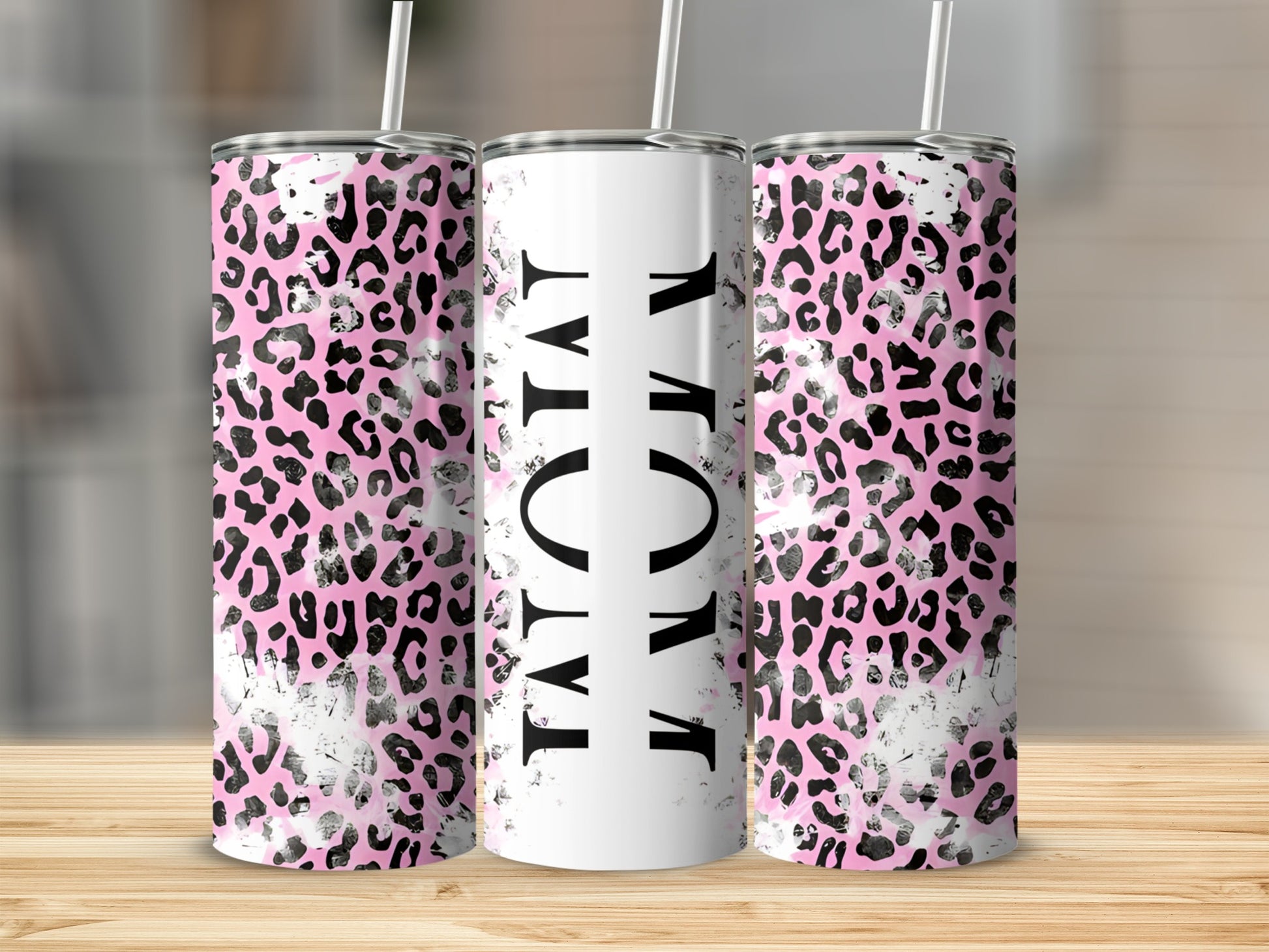 Pink leopard print tumbler with "MOM" text.