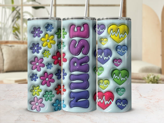 Tumbler with "NURSE" text and colorful floral and heart designs.