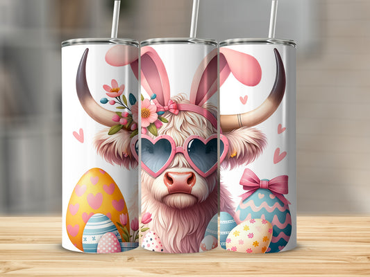 Easter Highland cow with bunny ears and heart sunglasses holding decorated eggs.