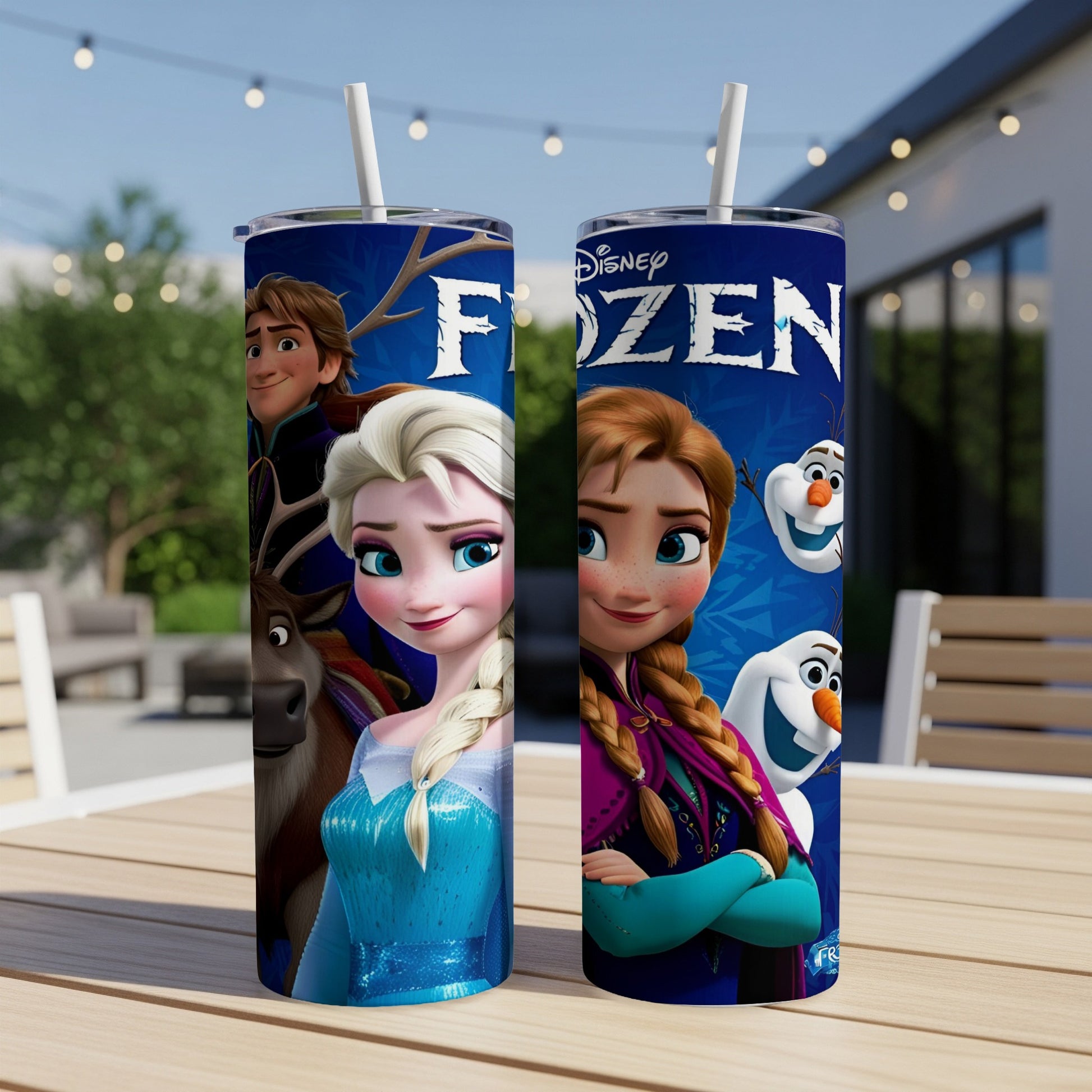 Disney Frozen characters Elsa, Anna, and Olaf on a blue patterned tumbler.