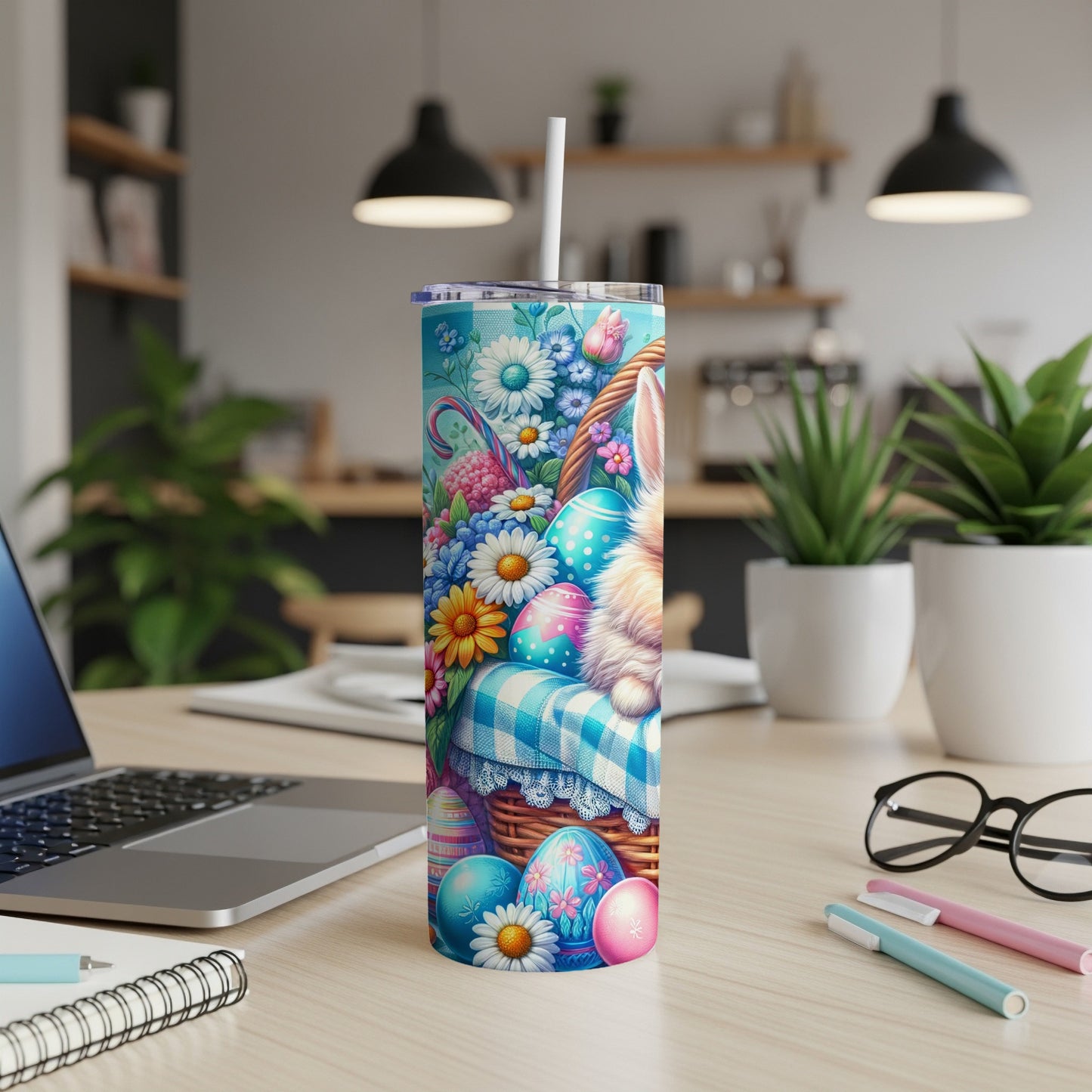 Easter bunny and eggs on blue checkered tumbler with floral accents.