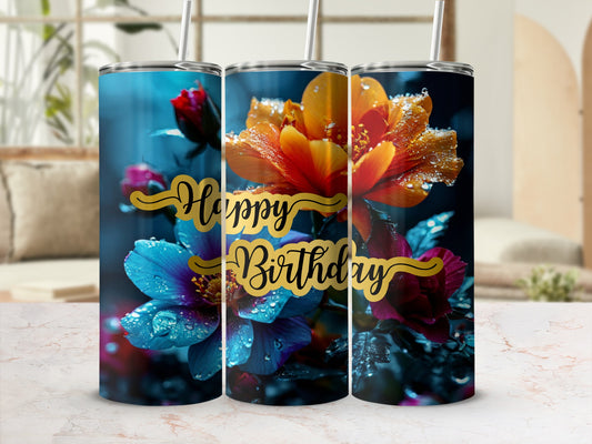 Happy Birthday tumbler with vibrant orange and purple flowers.