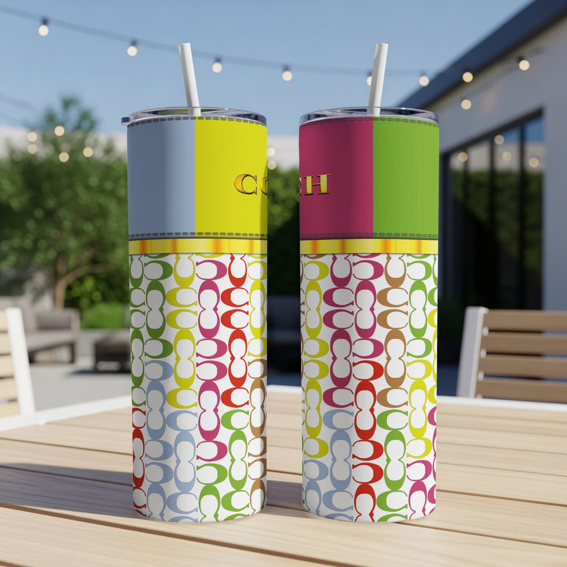 Colorblock tumblers with repeating pattern and gold "Coach" logo on yellow and pink sections.