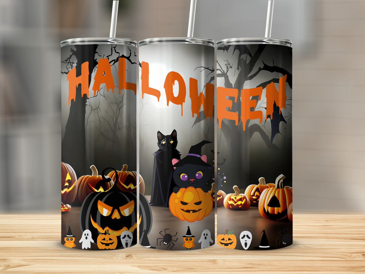 Three tumblers with a spooky Halloween theme featuring pumpkins, bats, ghosts, and cats.