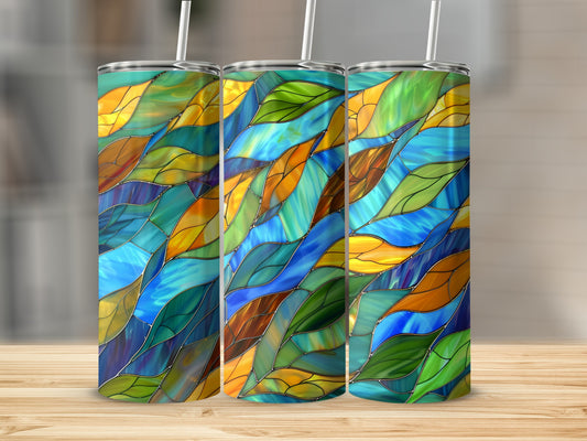 Three tall, insulated tumblers with a colorful stained-glass wave pattern.
