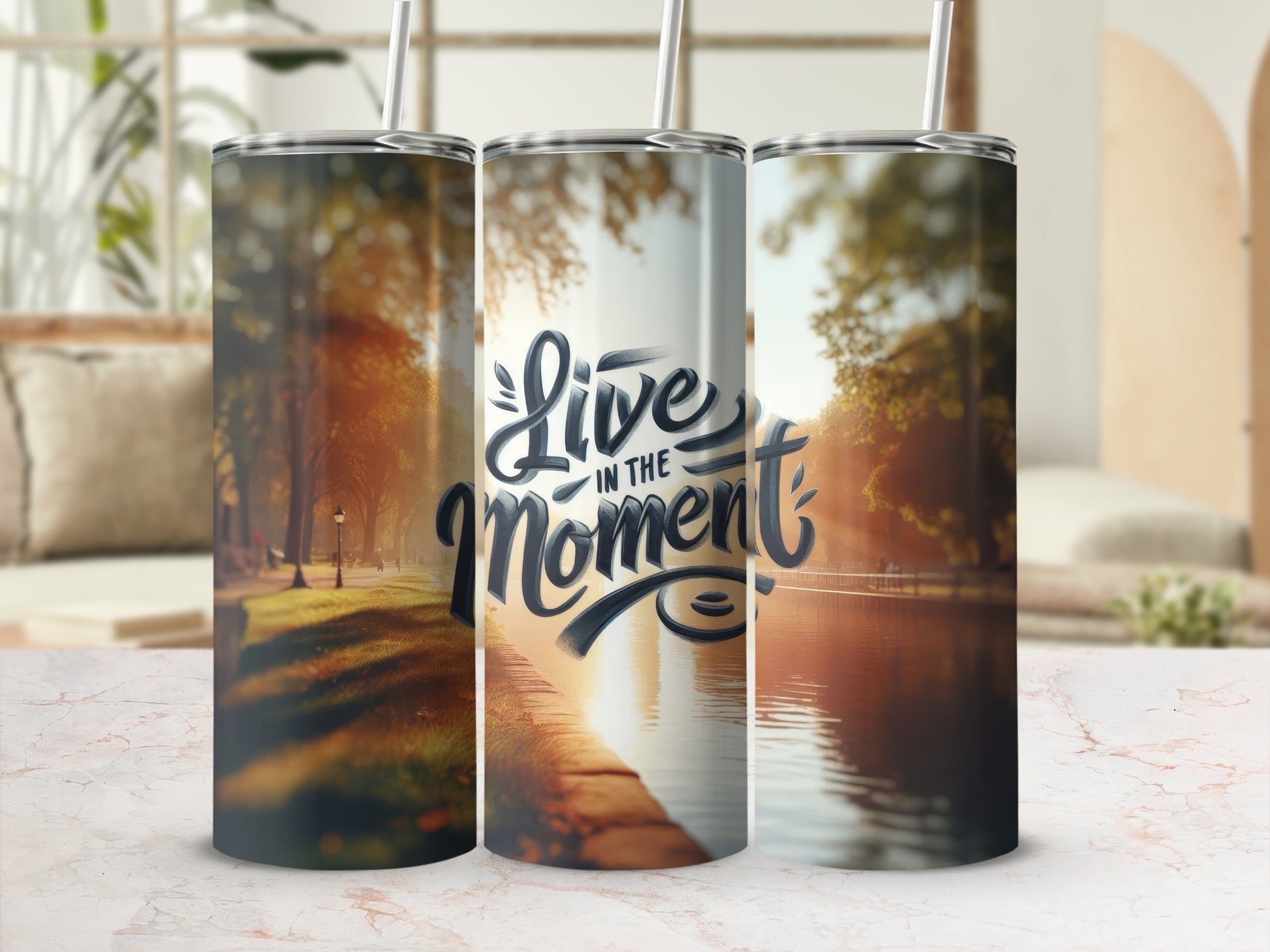 Three tumblers with "Live in the Moment" text against a serene park scene.