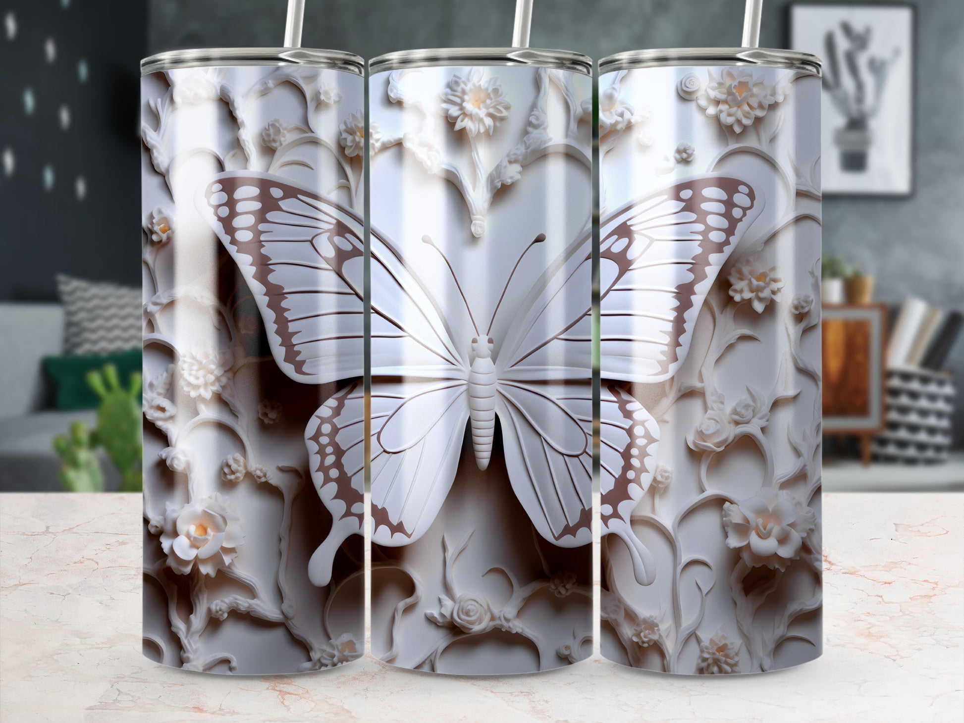 White tumbler with a textured butterfly and floral design.