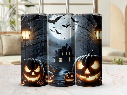Three tumblers with a Halloween design featuring a haunted house and jack-o'-lanterns.