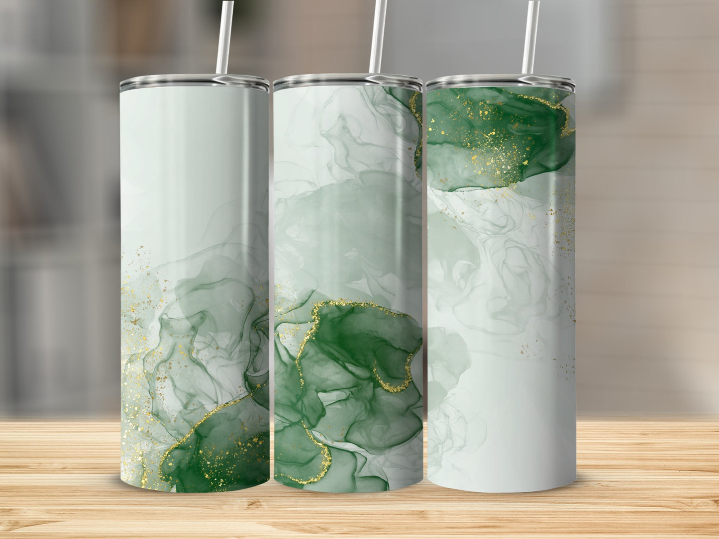 Three tumblers with green marble and gold glitter design.