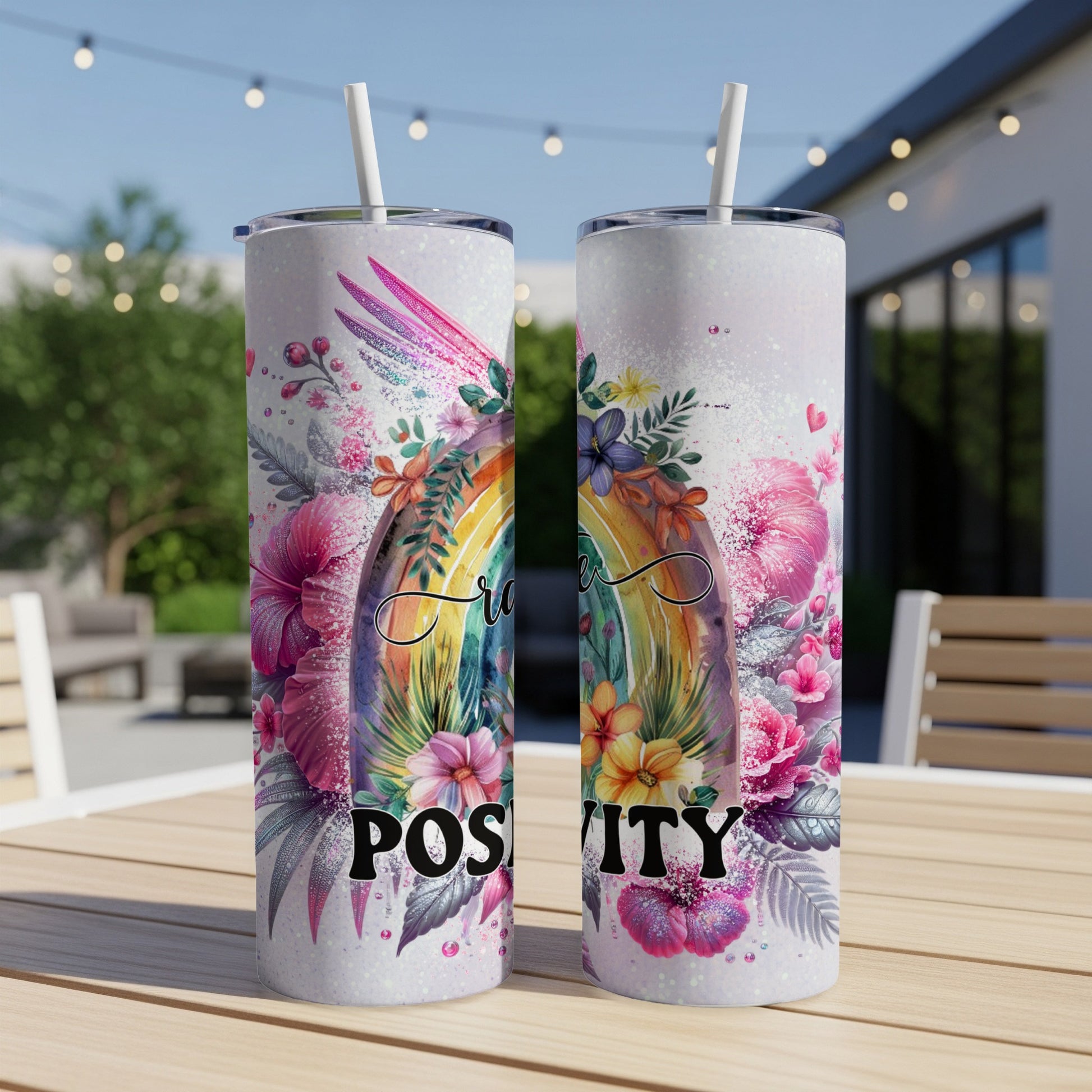 Two tumblers with rainbow and floral designs, "Positivity" text.