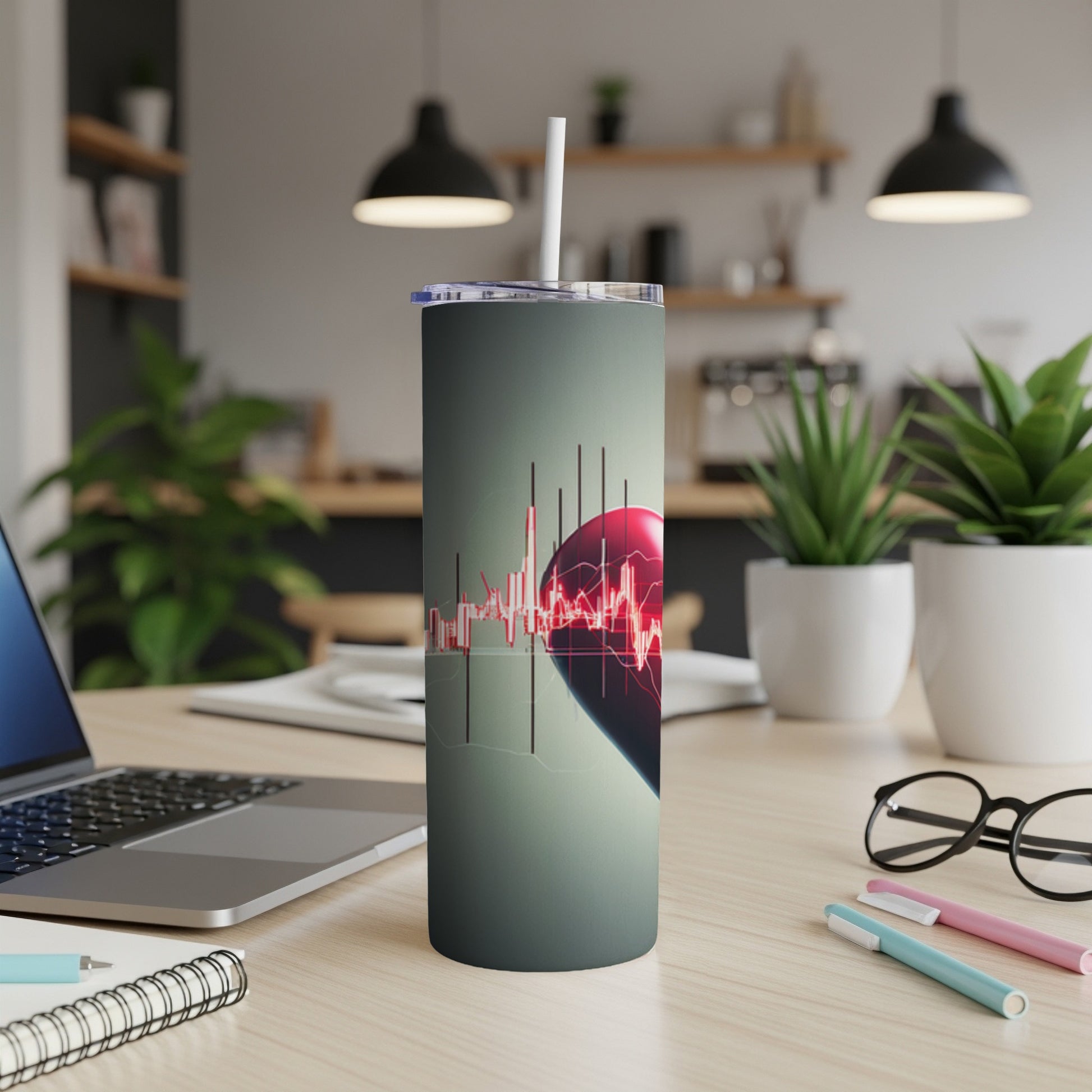 Tall tumbler with heart and stock market graph design.