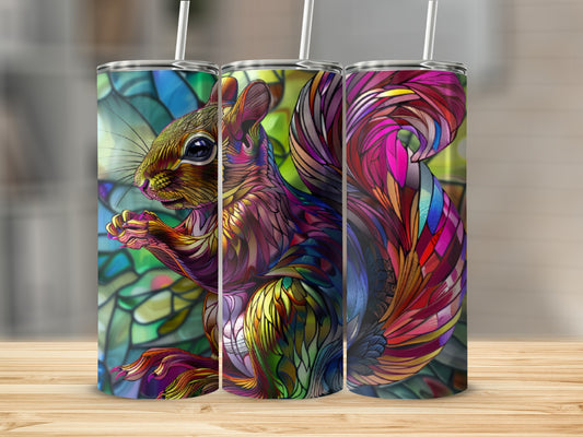 Colorful stained-glass squirrel design on three tumblers.