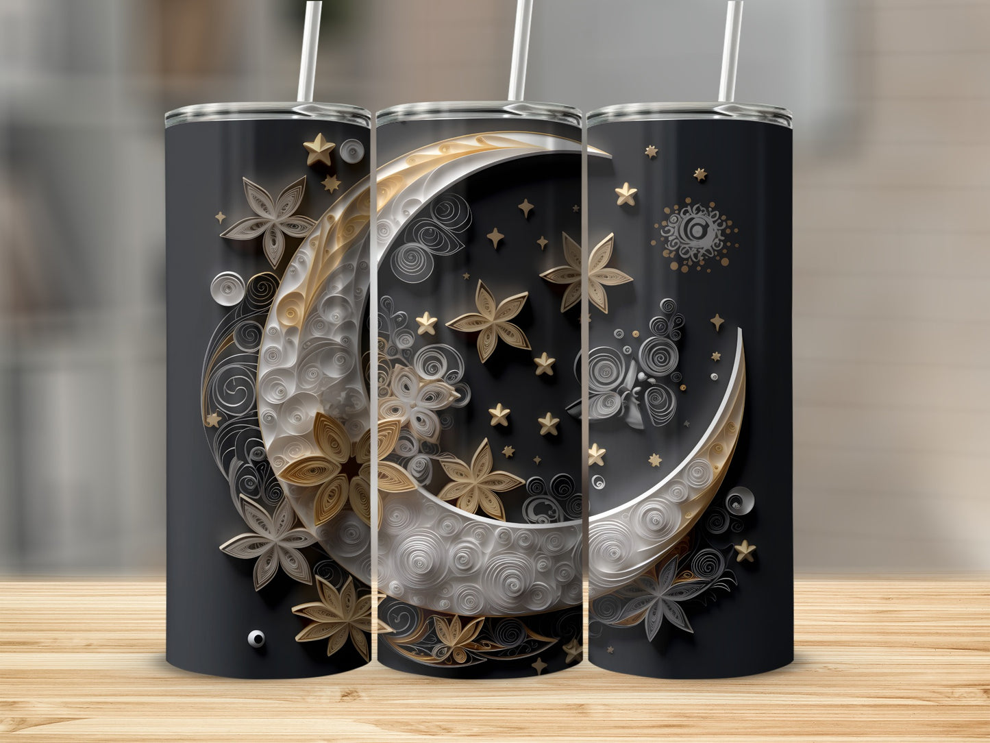 Three tumblers with crescent moon and star celestial designs.