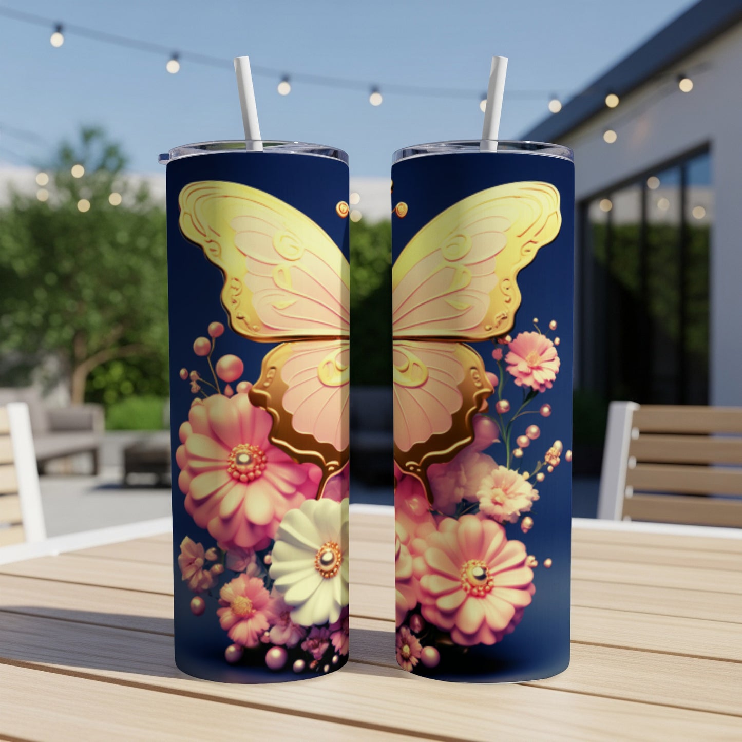 Two tumblers with butterfly and floral designs on a wooden table.
