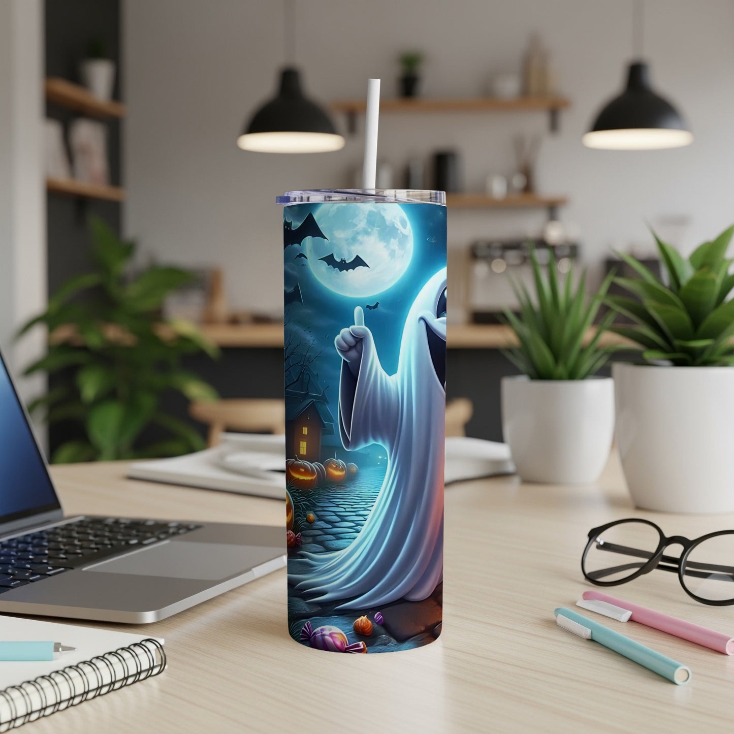 Halloween tumbler with a ghost, pumpkins, and bats under a full moon.