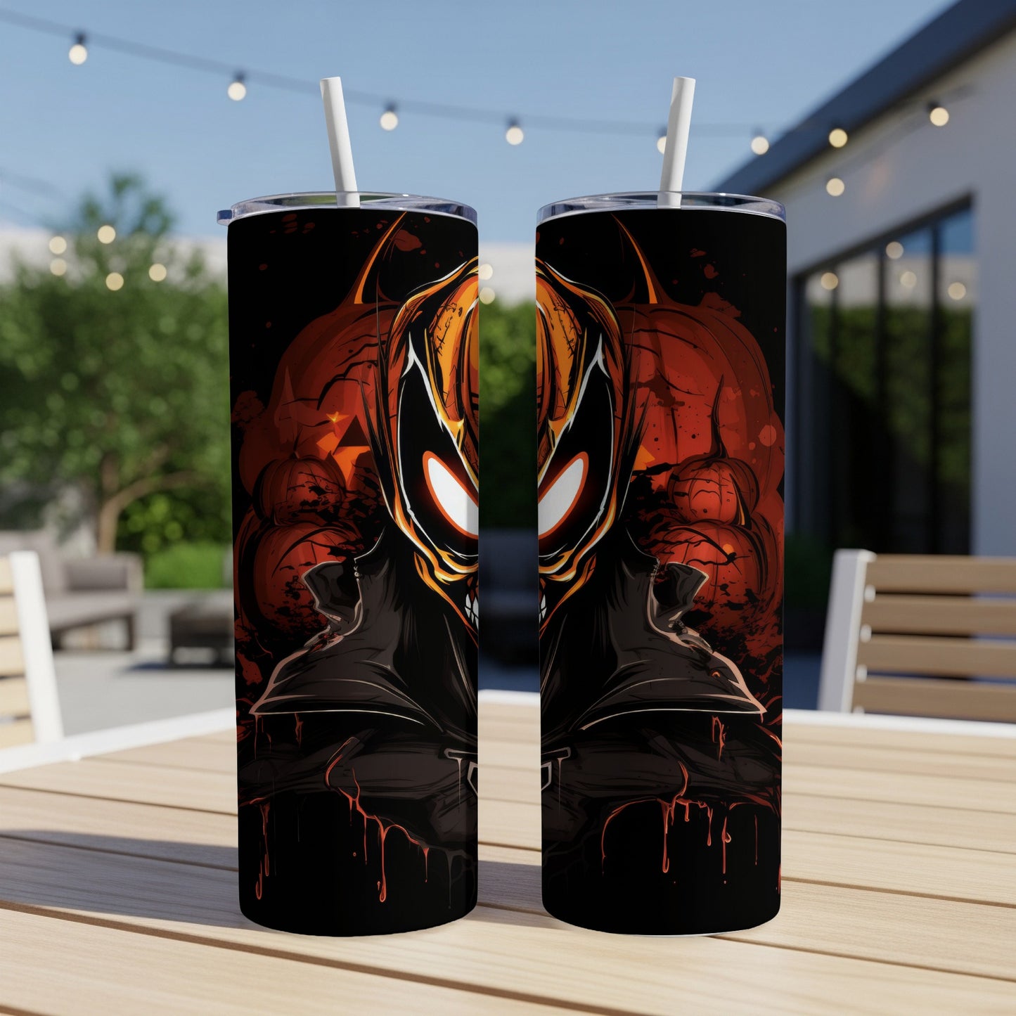 Two tumblers with a spooky Halloween-themed villain design featuring glowing eyes and pumpkins.
