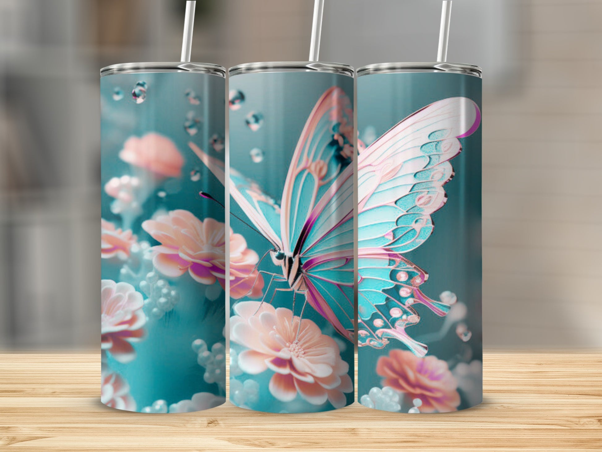 Three tumblers featuring a turquoise butterfly and pink flowers on a light blue background.
