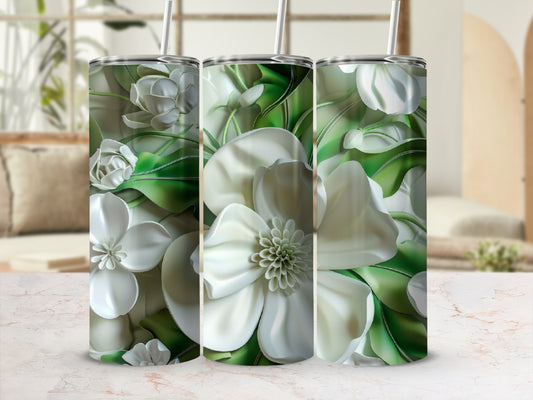 Three tumblers with white floral and green leaf designs.
