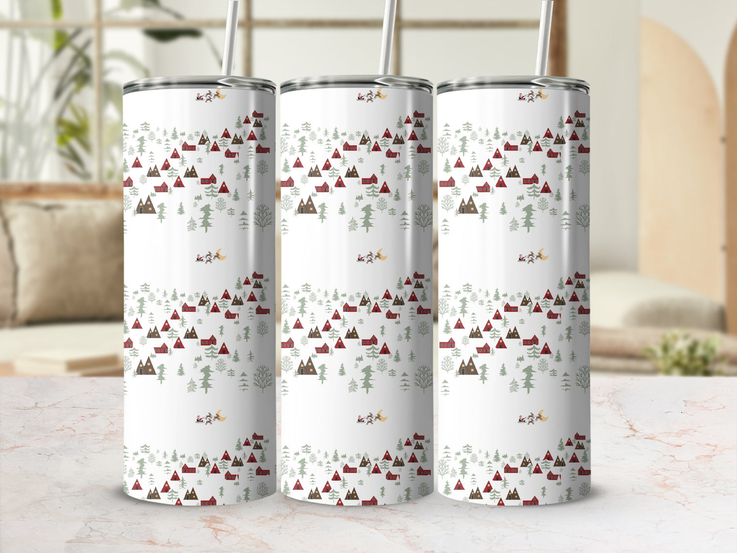 Three white tumblers with a Christmas village and trees pattern.