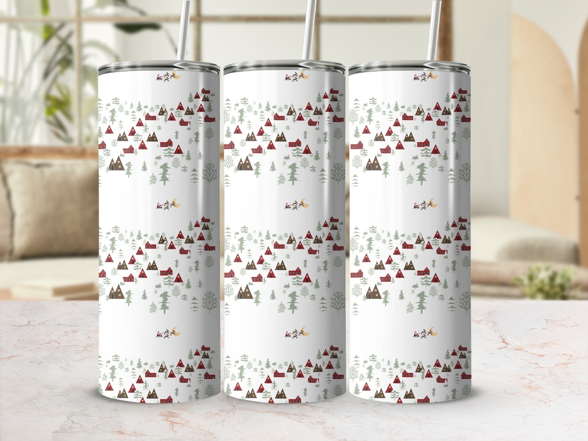 Three white tumblers with a Christmas village and trees pattern.