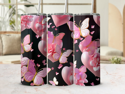 Pink butterflies and hearts on a black tumbler with straw.