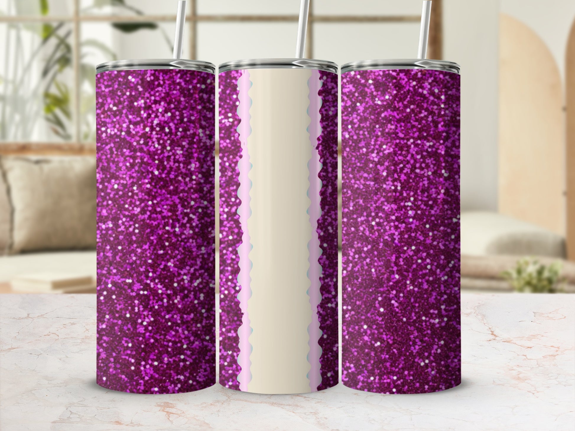 Three glittery purple tumblers with decorative trim on a marbled surface.