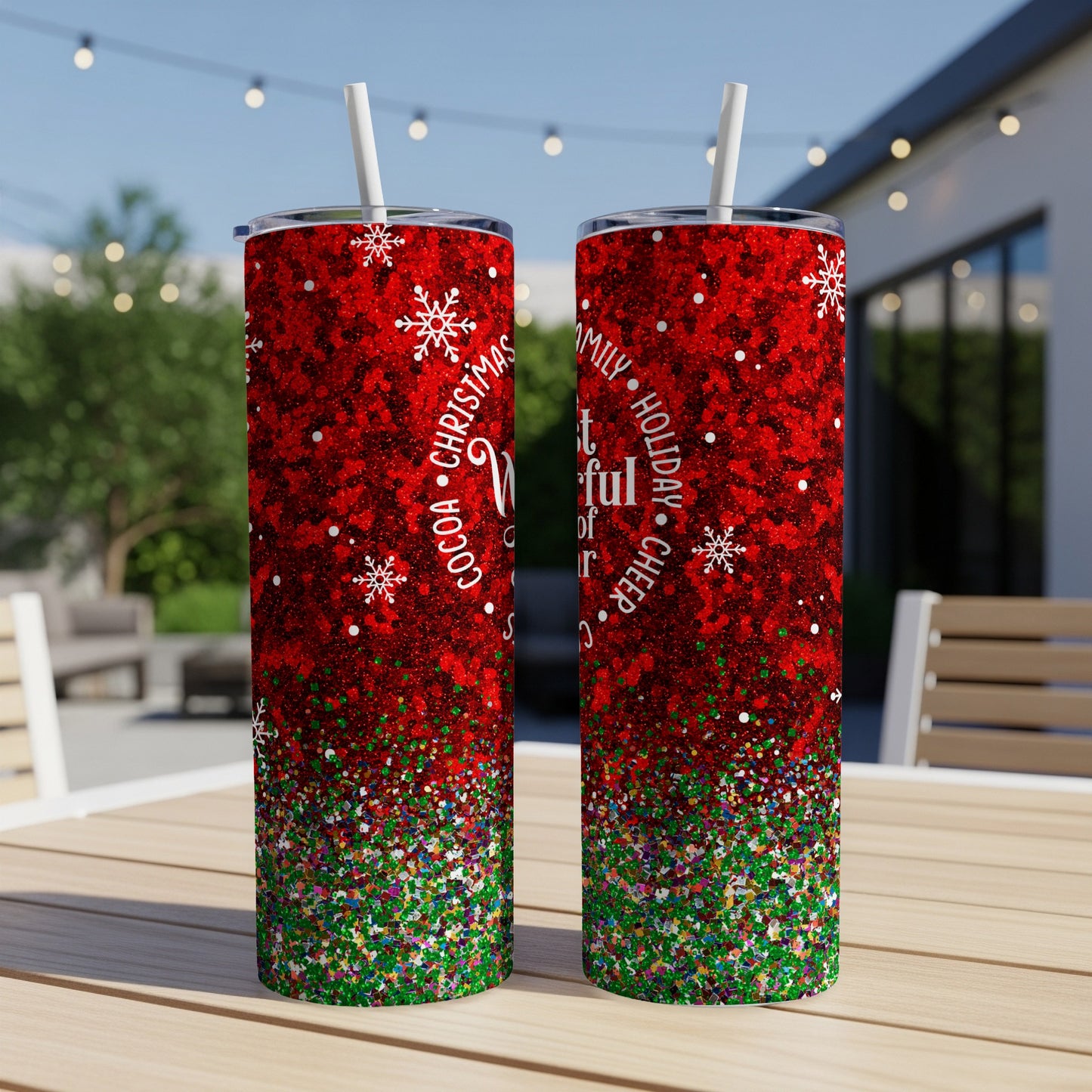 Red glitter tumbler with "Merry Christmas" and snowflakes, confetti bottom.