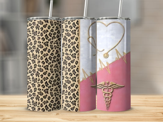 Leopard print and medical stethoscope tumbler set on wooden surface.