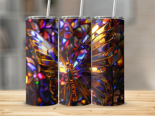 Stained glass butterfly design on three tumblers with straws.