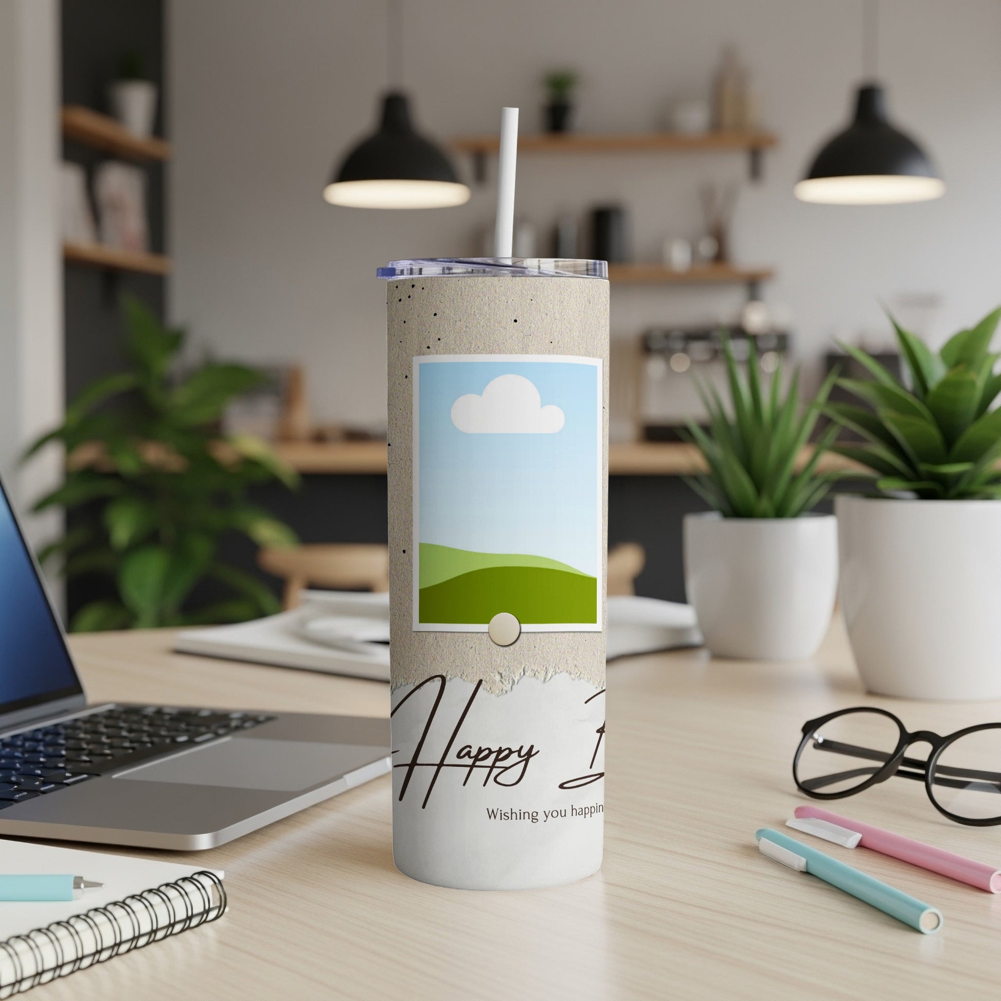 Concrete tumbler with "Happy 1st" text, a landscape photo, and a straw.