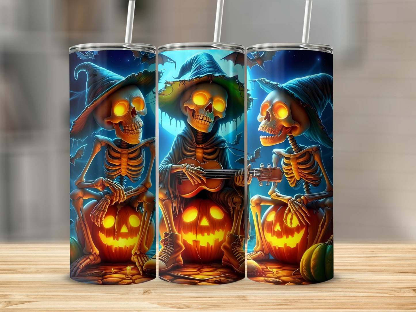 Three skeletons wear witch hats, one plays guitar, all sit on pumpkins.