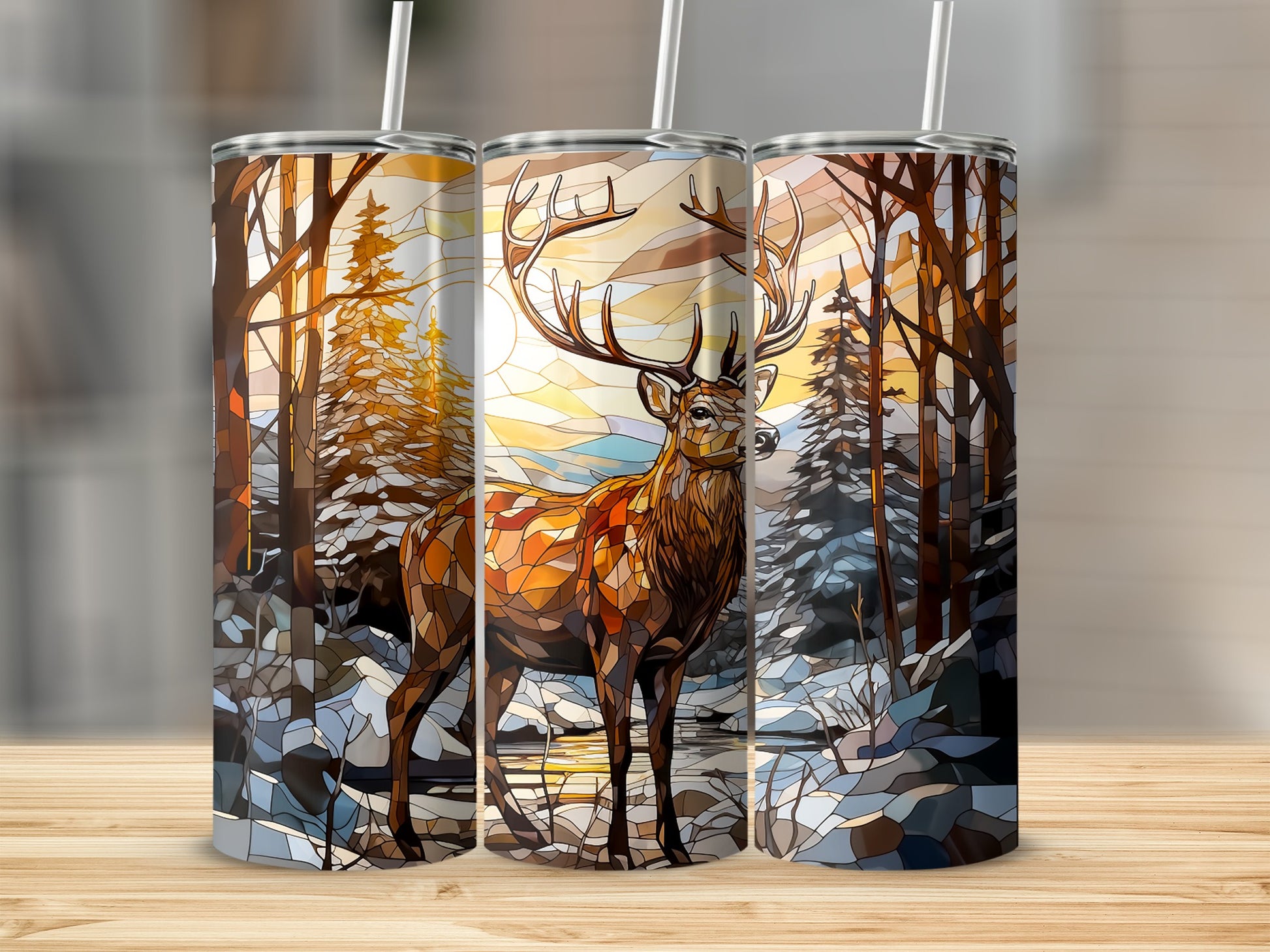 Stained glass art tumbler featuring a stag in a snowy forest at sunset.
