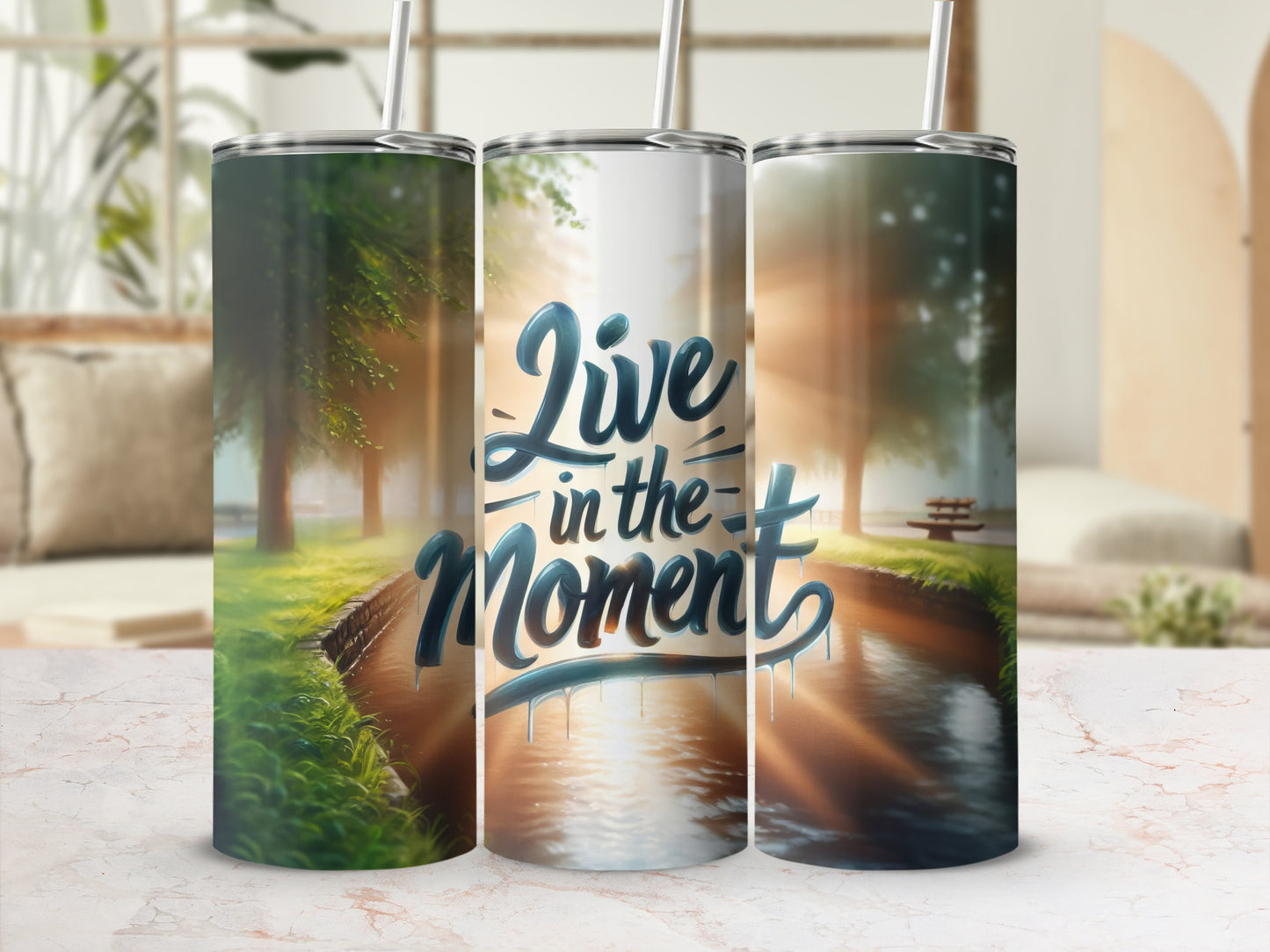 Three tumblers featuring "Live in the Moment" text over a water feature.
