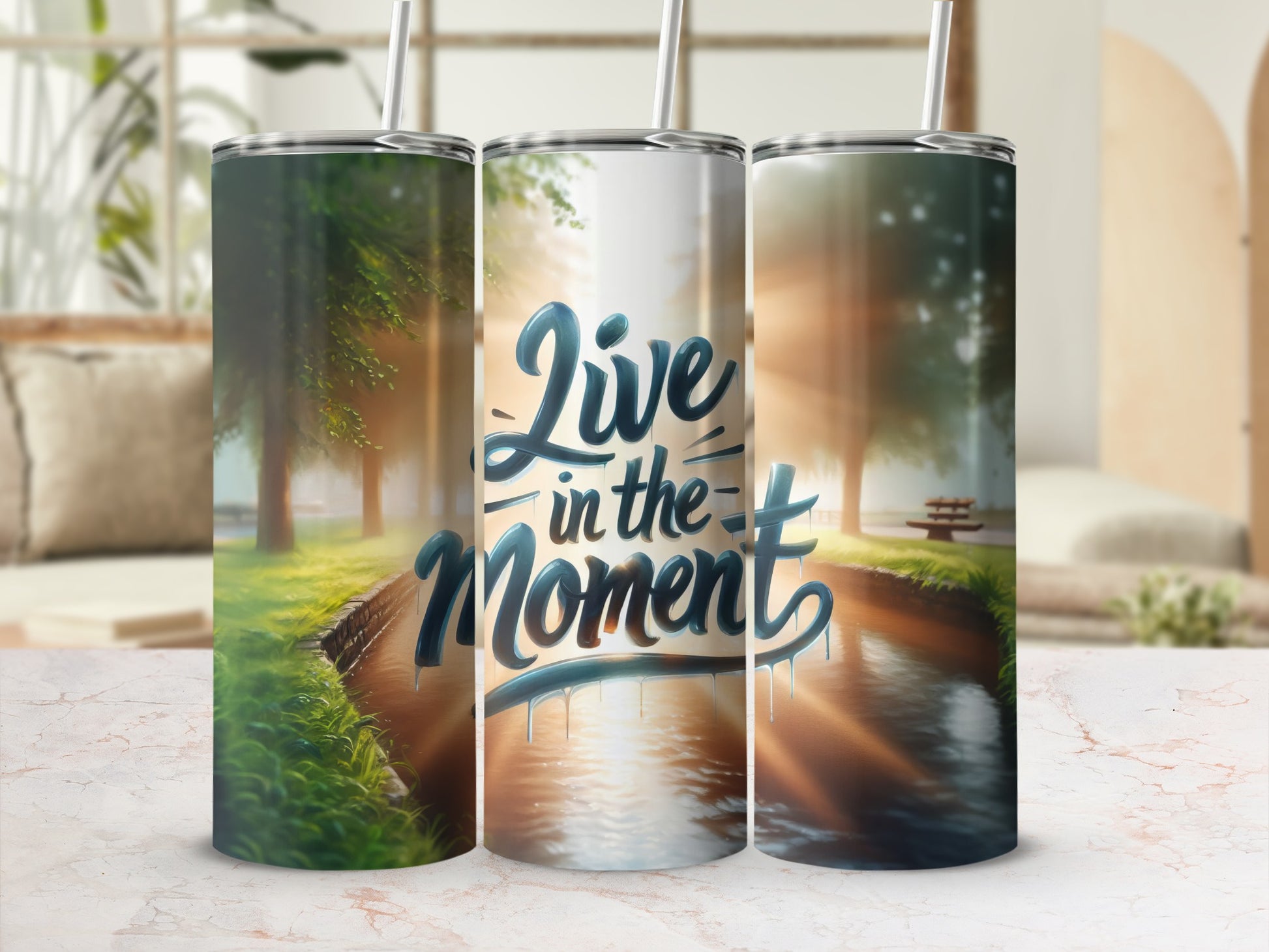 Three tumblers featuring "Live in the Moment" text over a water feature.