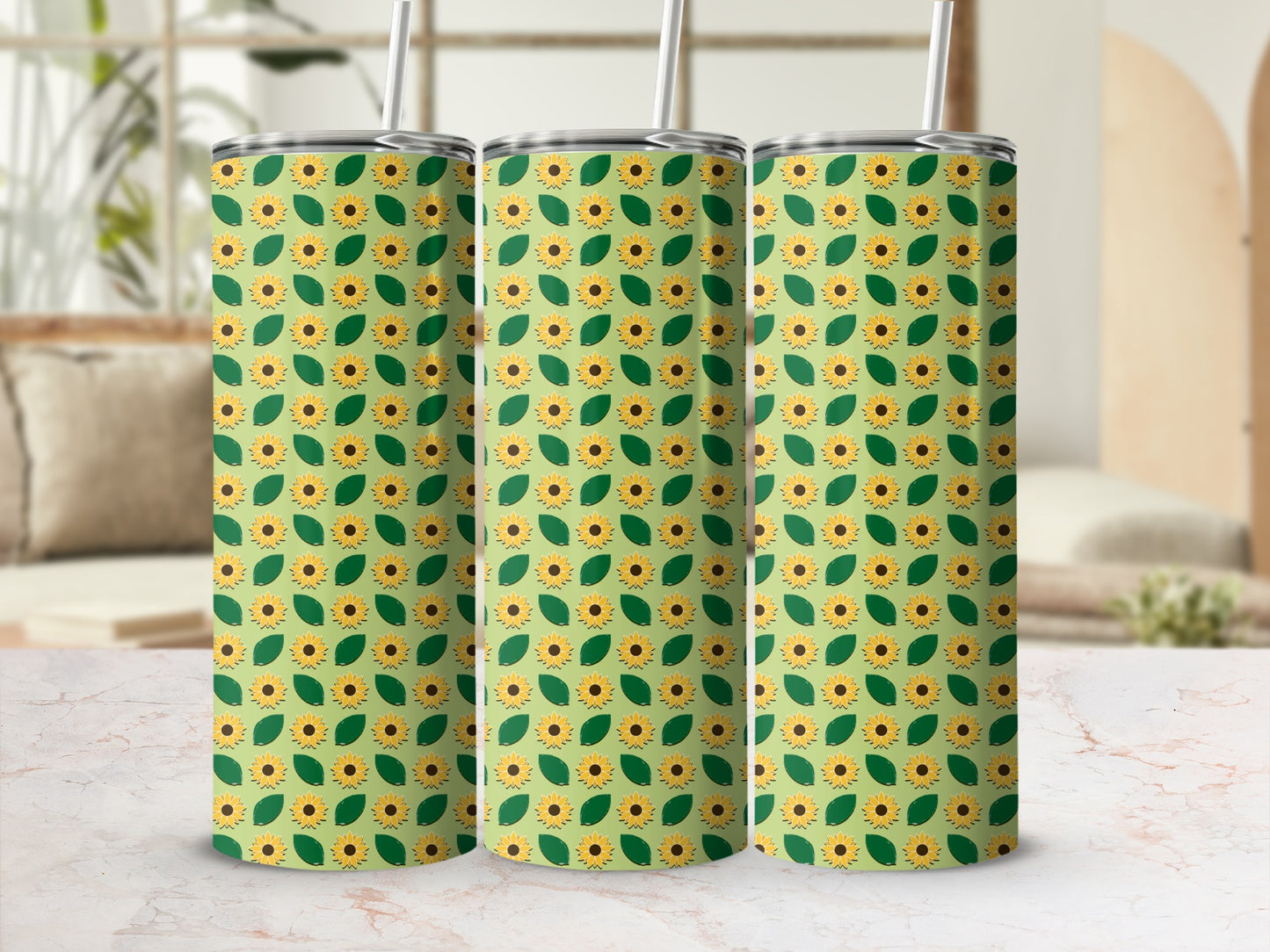 Three green tumblers with a sunflower and leaf pattern.