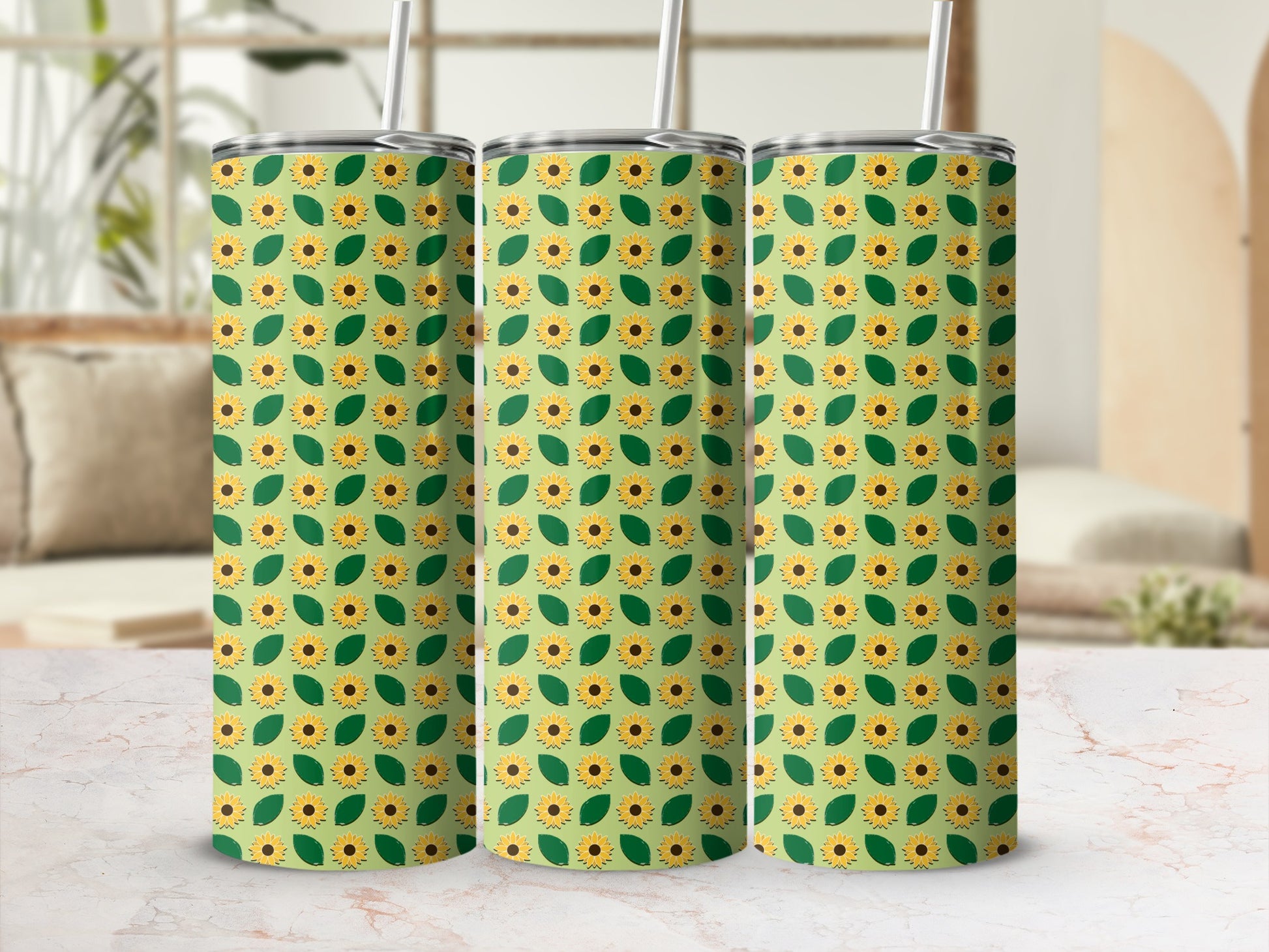 Three green tumblers with a sunflower and leaf pattern.