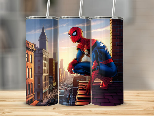 Spiderman crouches on a rooftop overlooking a city skyline at sunset.