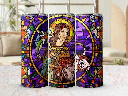Stained glass tumbler with depiction of Jesus and a lamb.