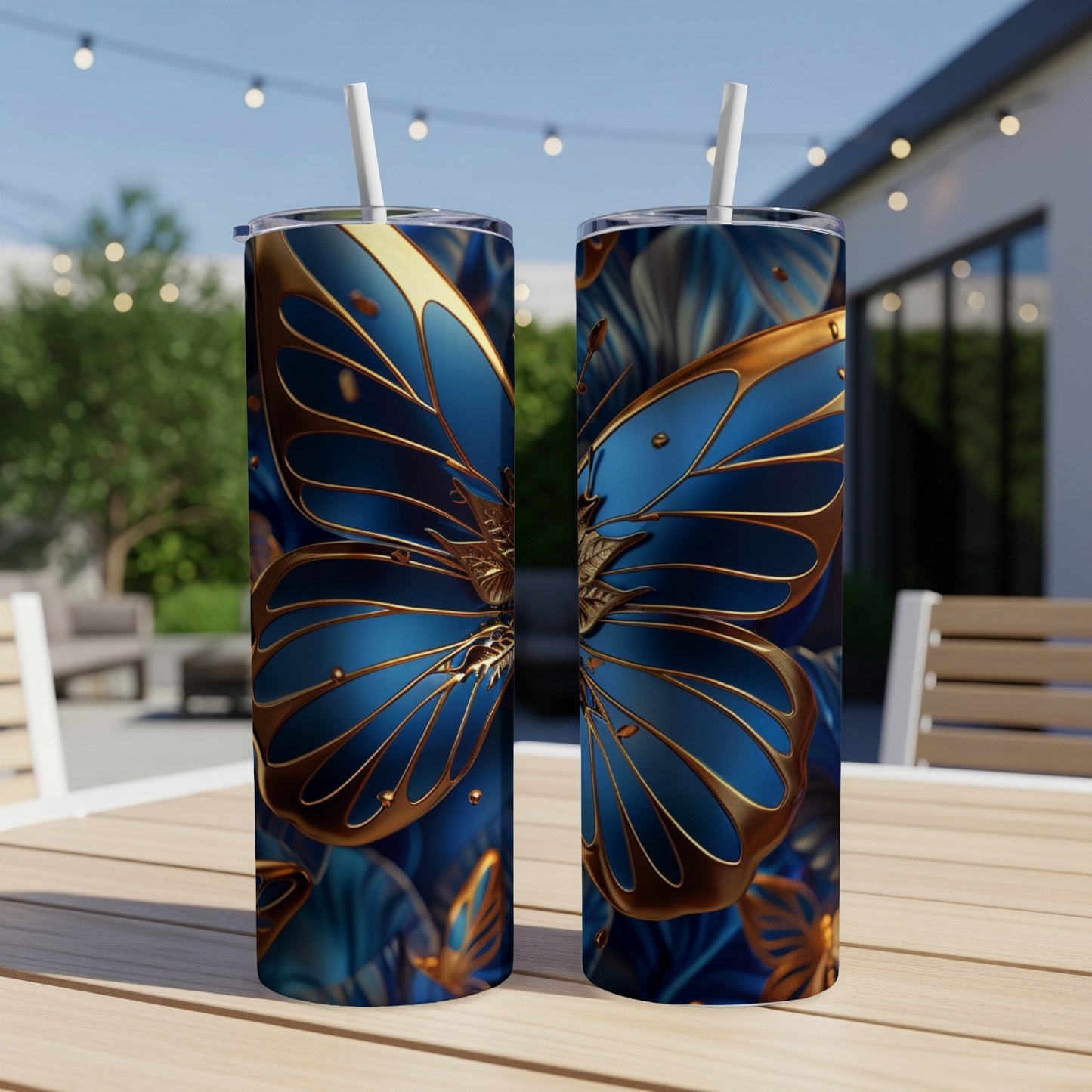Two blue and gold ornate butterflies on tall tumblers outdoors.