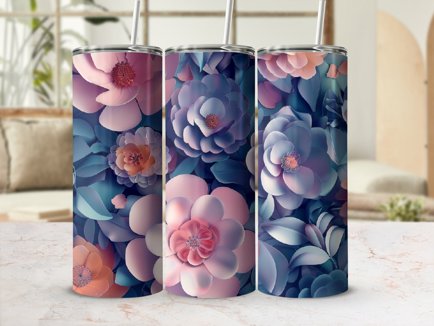 Three tumblers with a watercolor floral design in pinks, blues, and purples.