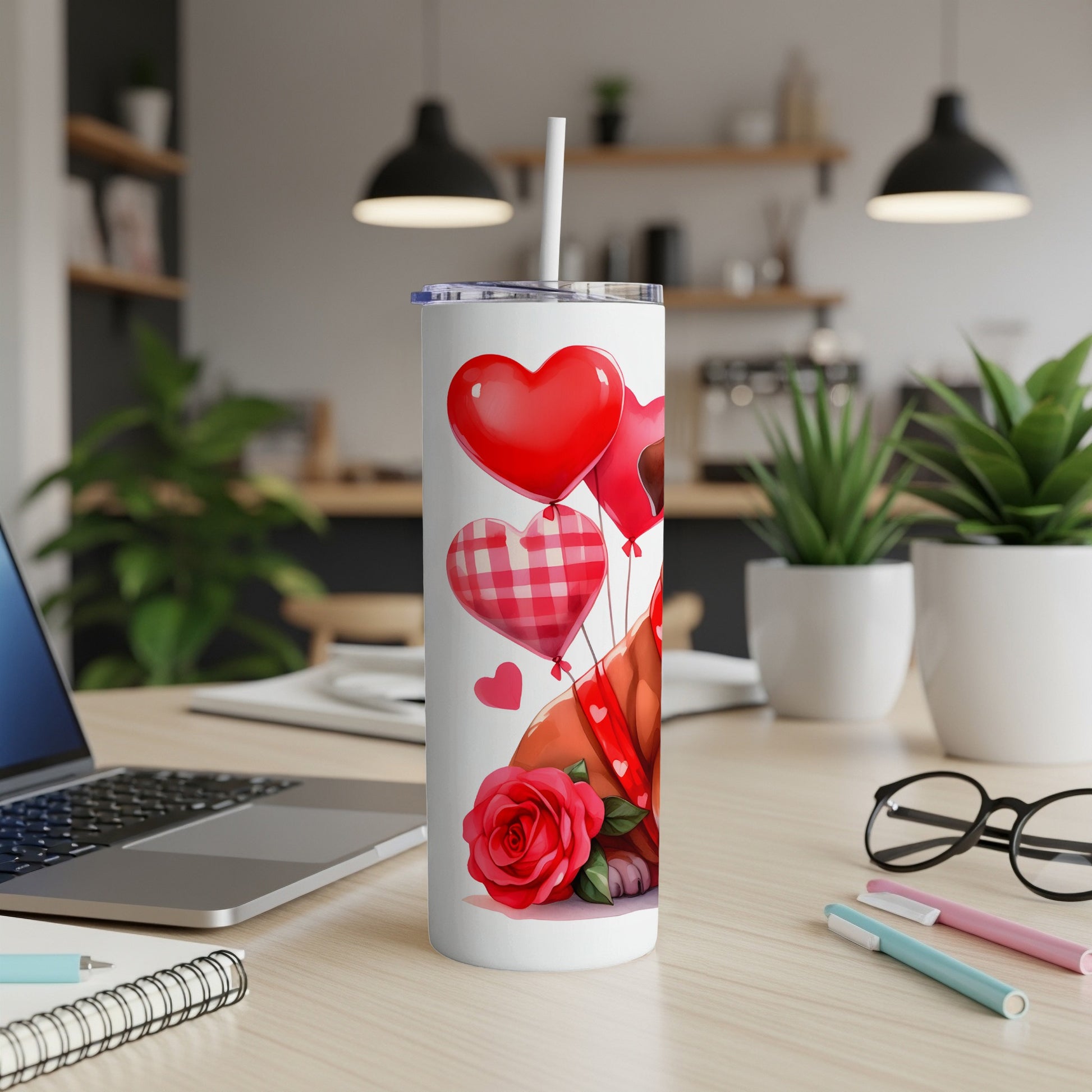 White tumbler with red hearts, a rose, and plaid accents.