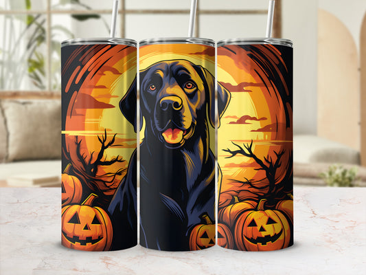 Black Labrador with Halloween pumpkins and spooky trees on a sunset background.
