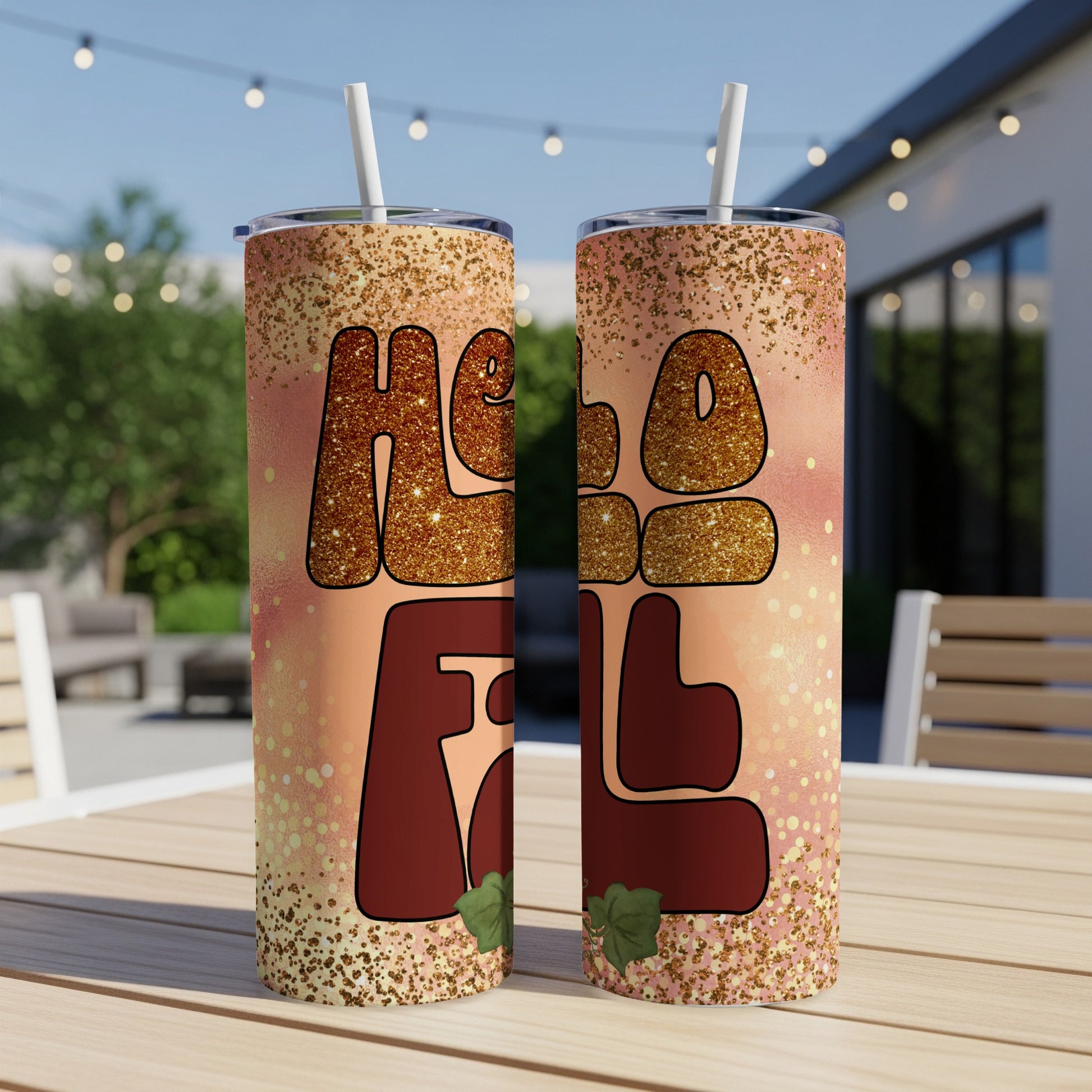 Two tall tumblers with "Hello Fall" text and glitter accents.
