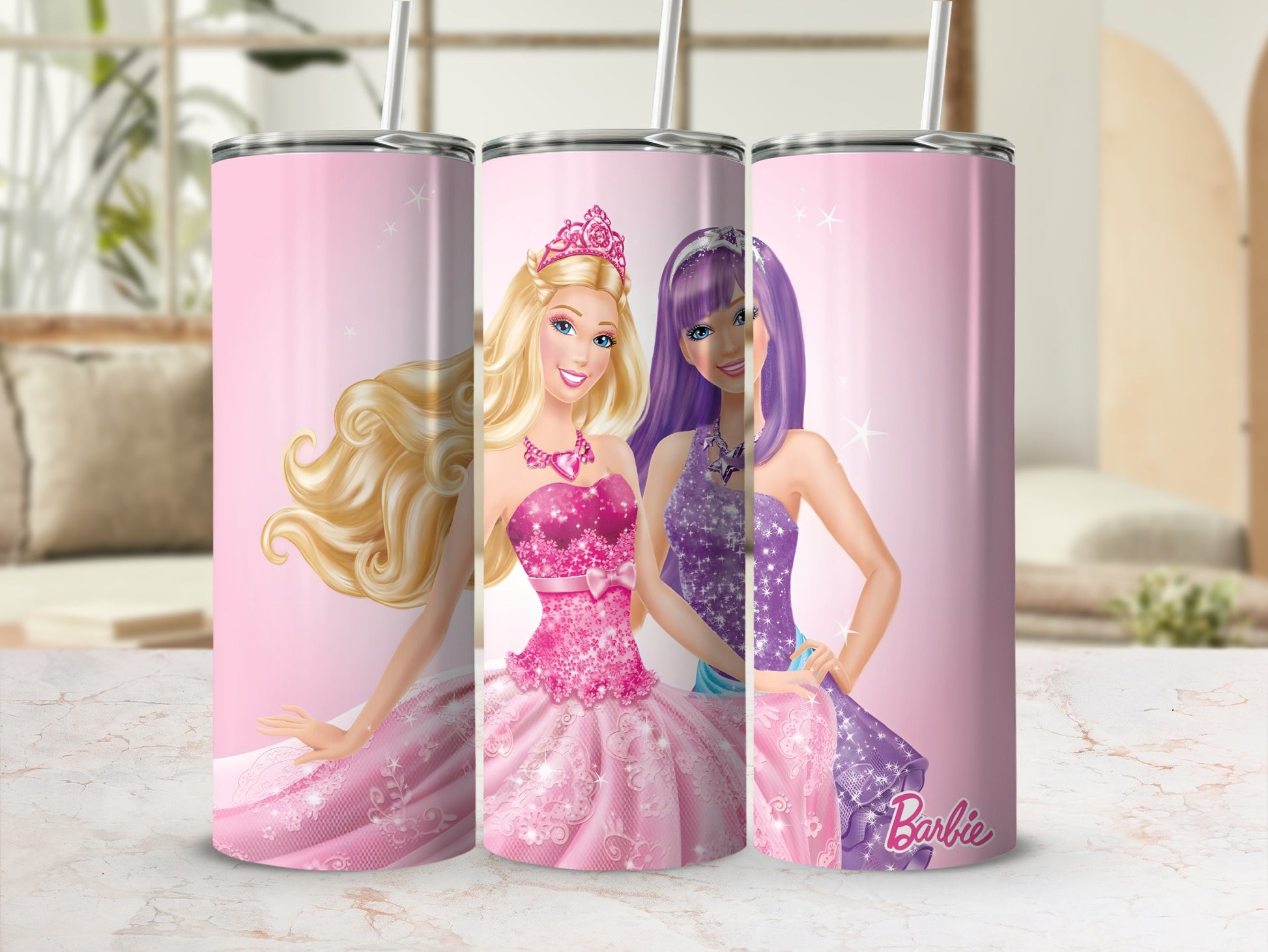 Barbie dolls in pink and purple sparkly dresses with straws on a textured surface.
