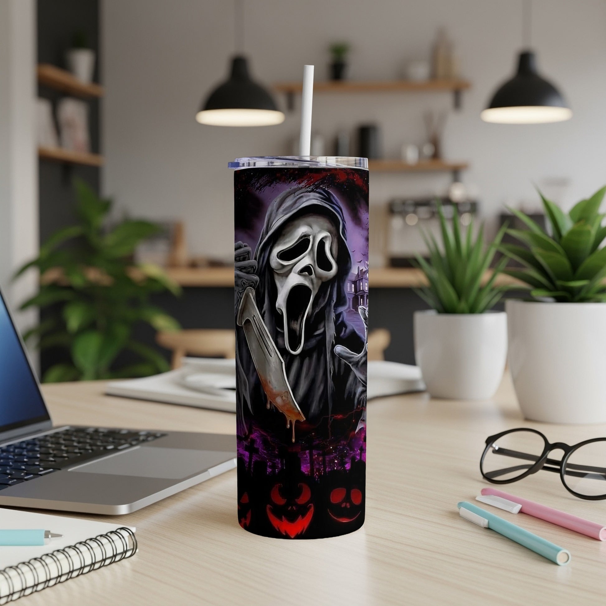 Scream mask character with bloody knife on a tumbler, featuring pumpkins and a graveyard.