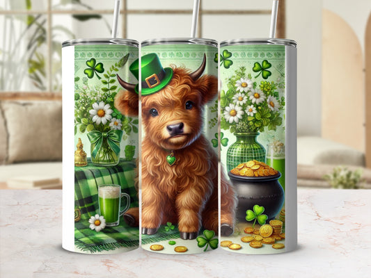Highland cow with a green hat and shamrocks on a tumbler.